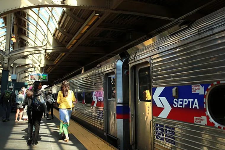 A SEPTA Trenton Line train pulls onto track four at 30th Street Station after service resumed, on Sunday June 15, 2014. ( DAVID SWANSON / Staff Photographer )