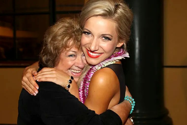 Miss New Jersey 2013 Cara McCollum (right) hugs her chaperone Sally Johnston.
Courtesy of Sally Johnston