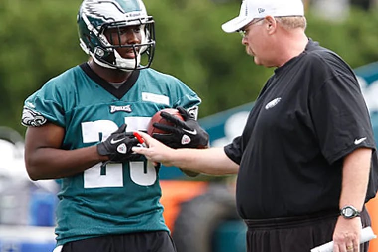LeSean McCoy and Andy Reid are both under scrutiny after a disappointing 2011 campaign. (David Maialetti/Staff Photographer)