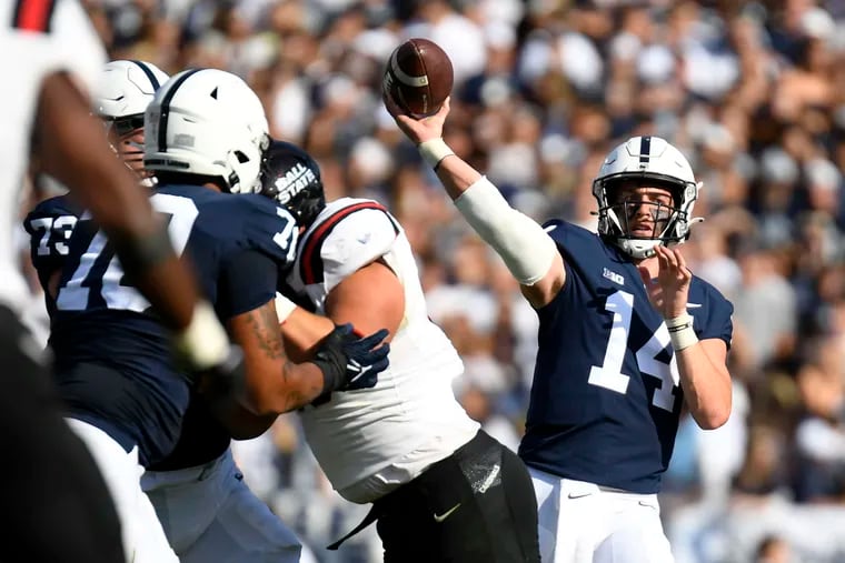 Penn State quarterback Sean Clifford (14) passes against Ball State during the first half of an NCAA college football game in State College, Pa., Saturday, Sept. 11, 2021.