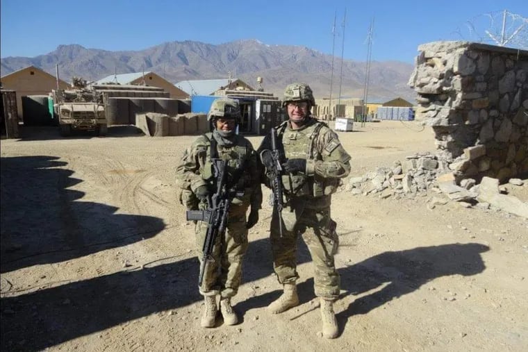Jasmine Walker Motupalli (left) then a captain in the U.S. Army, is shown in Afghanistan in 2012 with 1st Sgt. Shane Werst.