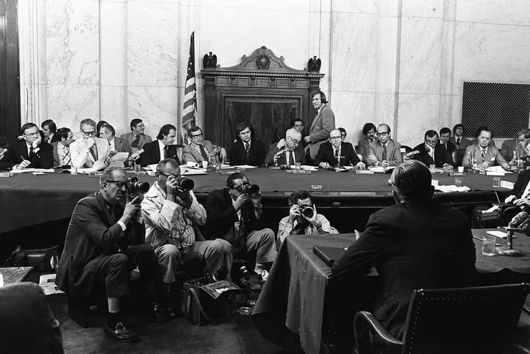 In this Aug. 3, 1973, file photo, the Senate Watergate Committee hearings continue on Capitol Hill in Washington. From left are: Sen. Lowell P. Weicker, Jr; Sen. Edward J. Gurney, Fred Thompson, Sen. Howard H. Baker, Jr; Rufus Edmisten, Sen. Sam Ervin; Sam Dash, Sen. Joseph M. Montoya, Sen. Daniel K. Inouye was absent. Testifying is Lt. Gen. Vernon Walters. In 1973, millions of Americans tuned in to what Variety called "the hottest daytime soap opera"  —  the Senate Watergate hearings that eventually led to President Richard Nixon's resignation.