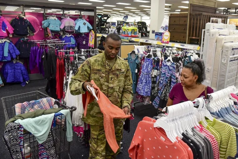 First Lt. Garon Lindo, an Army logistic officer, and his wife Roxanne, shop at the Joint Base Maguire/Dix/Lakehurst  Exchange shop. A policy change that takes effect on Veterans Day allows honorably discharged veterans to shop online tax-free  for life at all AAFES stores.
