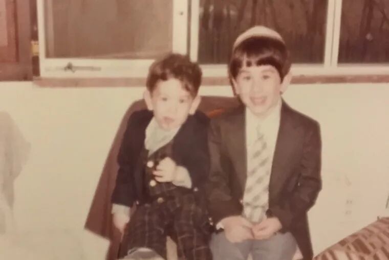 Michael Solomonov (right) and his younger brother, the late David Solomonov (left), in their house in Squirrel Hill.
