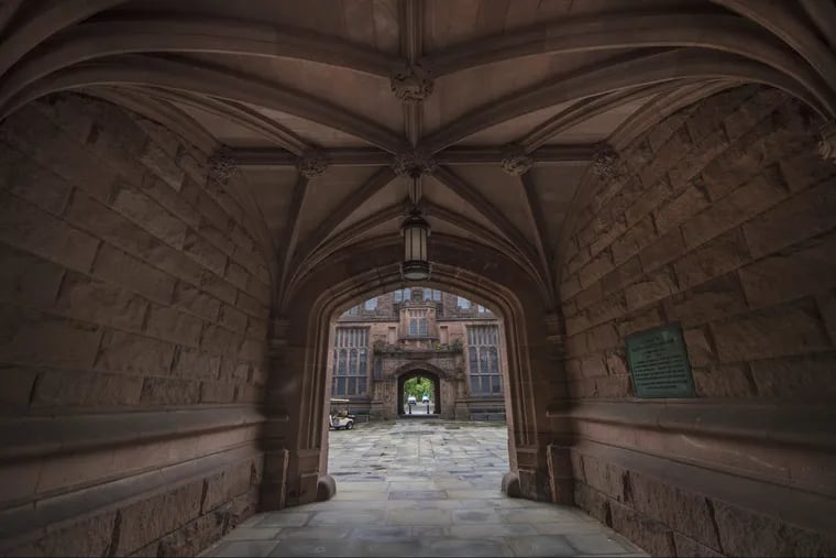 A view from the East Pyne courtyard through the building's eastern arch. The arch has been named in honor of James Collins "Jimmy" Johnson. a former slave who sold snacks to students on Princeton's campus for more than 60 years. The renaming is part of the university's effort to recognize its ties to slavery and create a more diverse and inclusive campus.