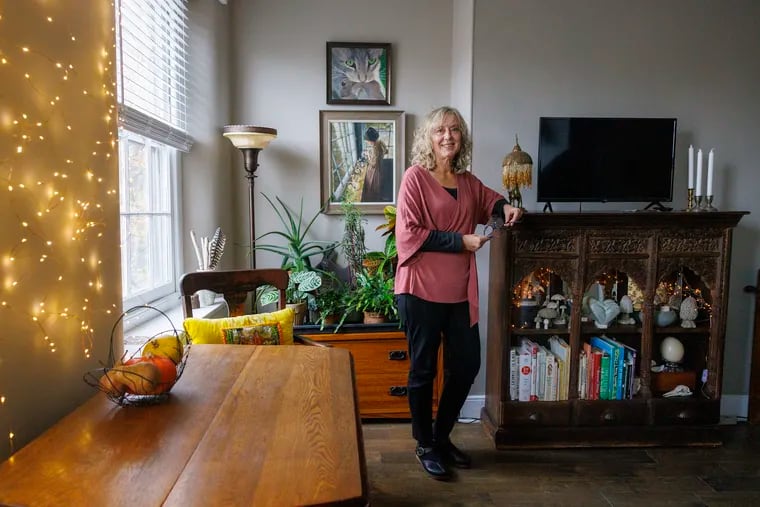 Kati Sowiak, moved from a large Victorian to a smaller 2 bedroom apartment in Newtown, PA. Photograph at her home on Monday, October 30, 2023.