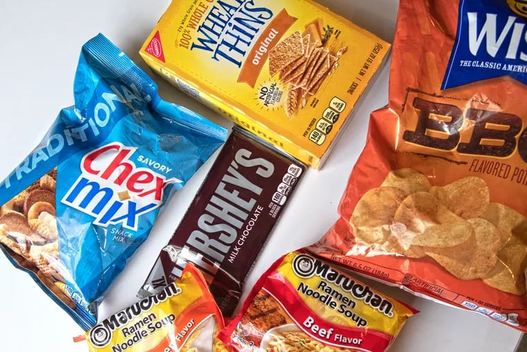 The Department of Corrections' commissary list includes Chex Mix, Wise BBQ potato chips, Hershey's milk chocolate bars, and ramen.