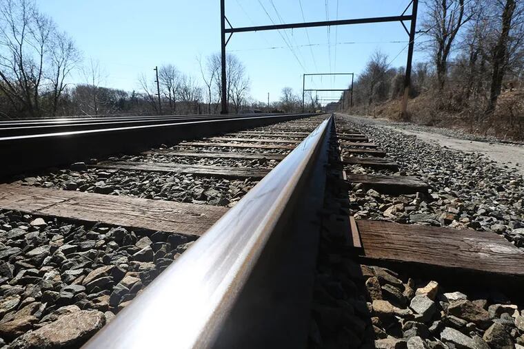 SEPTA train tracks between Hulmeville Rd., and Hulmeville Ave., in Langhorne, Pa., on Mar. 12, 2015. ( DAVID SWANSON / Staff Photographer )