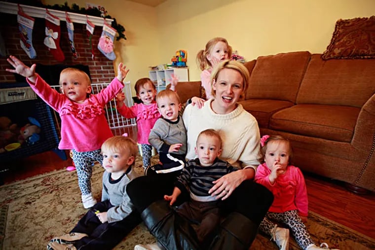 &quot;I felt like this happened for a reason,&quot; says Stacey Carey of Feasterville, with her 18-month-olds (from left) Olivia, John, Emma, Patrick, Connor, and Samantha. Daughter Julianna, almost 3, stands at rear. DAVID SWANSON / Staff Photographer