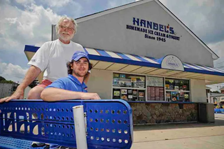 Owner Buck Buchanan and son Casey outside the Berwyn store. (Ron Tarver / Staff Photographer)