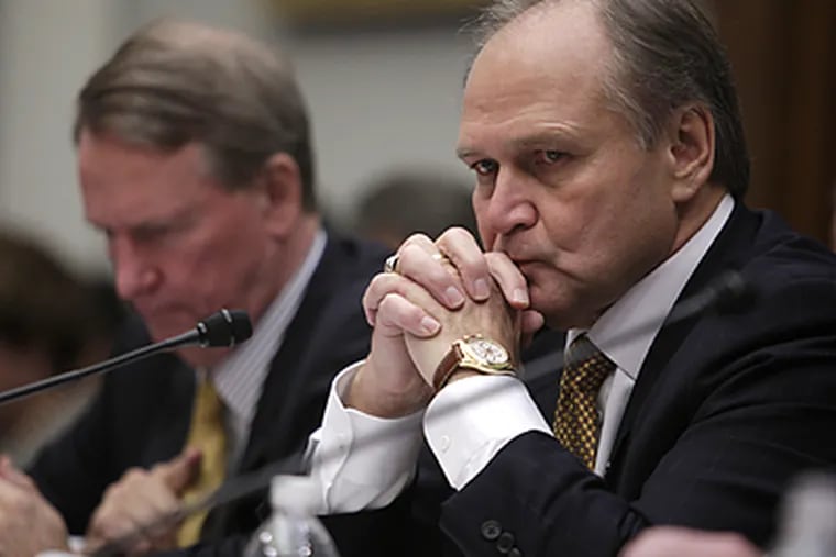 The CEOs of the big three American auto makers, including Chrysler's Robert Nardelli (right) and General Motors' Rick Wagoner (left), went to Congress last week to ask for a $25 billion bailout. (Evan Vucci/AP)