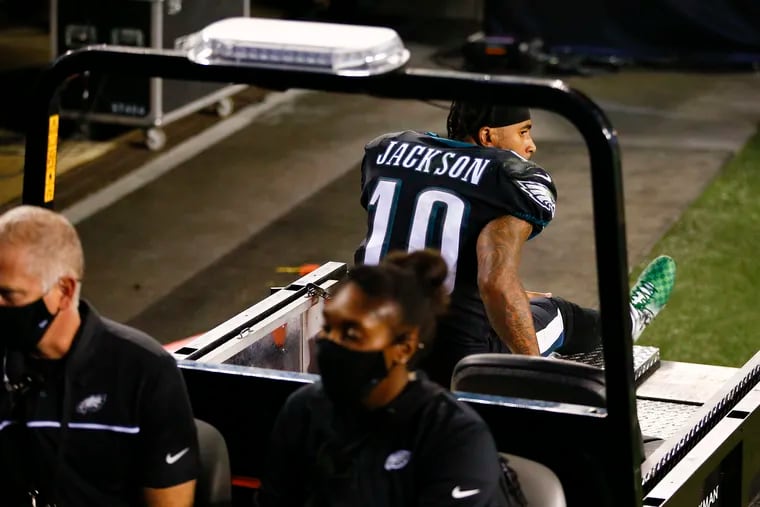 Eagles wide receiver DeSean Jackson gets carted off the field after getting injured while attempting to return a punt in the fourth quarter against the Giants.