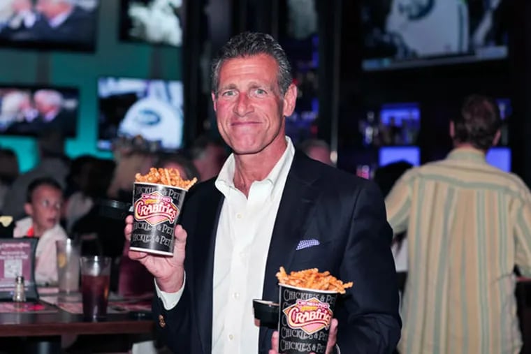 Chickie’s & Pete’s owner Pete Ciarrocchi with his trademarked Crabfries, in a 2015 photo. The Pennsylvania Gaming Control Board fined the restaurant $20,000 for serving alcohol to visibly intoxicated patrons at its outlet in Parx Casino, Bensalem.