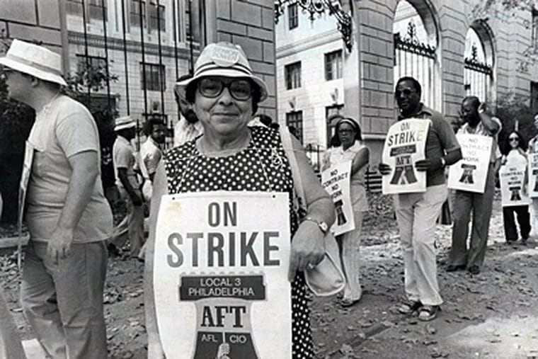 In the opinion of some union leaders, this 1980 scene of striking Philadelphia teachers picketing school district offices could be repeated if the School Reform Commission is able to reopen union contracts to get concessions. (Michael Viola / Staff Photographer, file)