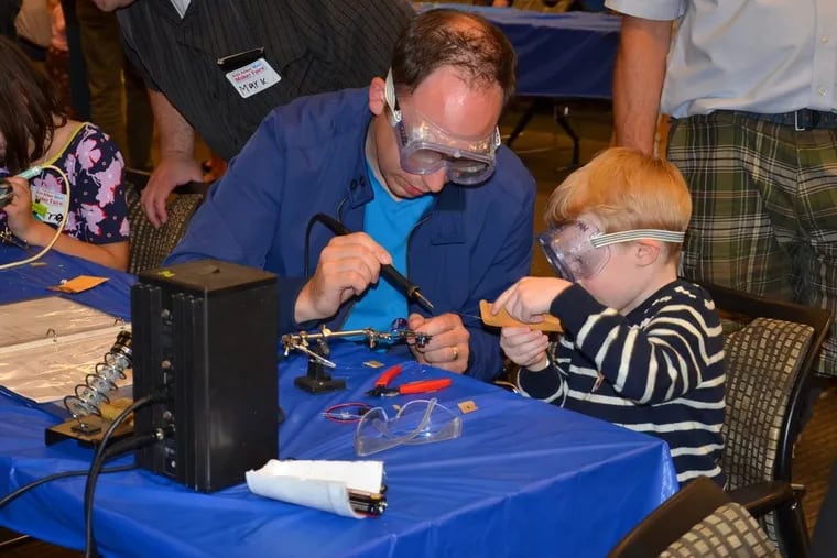 Why does time seem to fly when kids are cute and inquisitive, as at this Michigan "mini maker" fair?