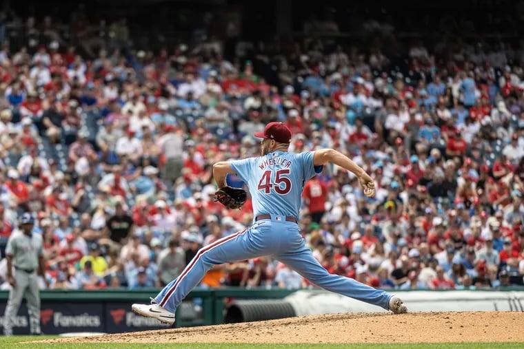 Phillies starter Zack Wheeler pitches during the fourth inning against the Texas Rangers on Thursday. Wheeler completed seven innings in the 5-2 victory.