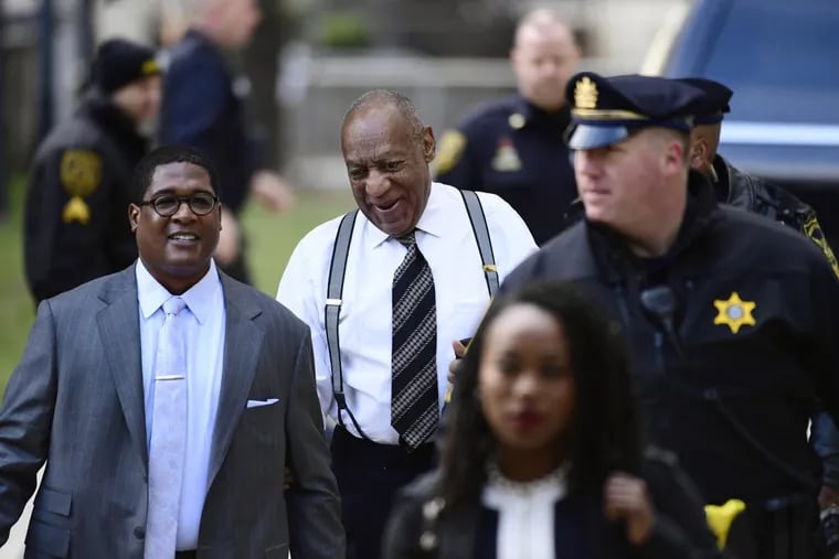 Bill Cosby, center, arrives for his sexual assault trial at the Montgomery County Courthouse, Thursday, April 5, 2018, in Norristown, Pa.