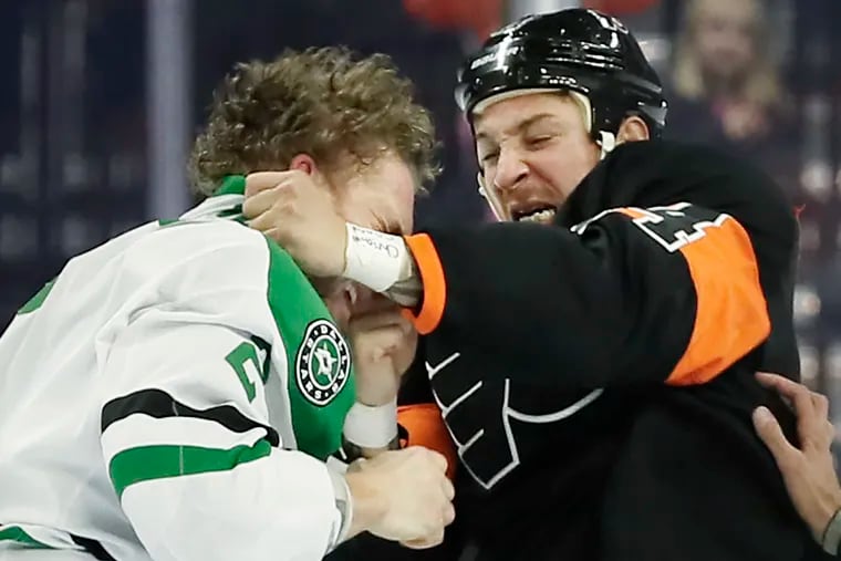 Chris Stewart (right) delivers a righthanded upper-cut to the schnoz of Dallas defenseman Jamie Oleksiak during their first-period fight.