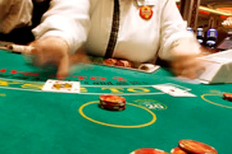 Blackjack dealer Joanne Mensing, of Pleasantville, N.J., at the Showboat Casino. The casinos, says a dealer, &quot;are making a ton of money. . . . Yet they are basically scrimping and cutting the dealers&#0039; pay and benefits.&quot;
