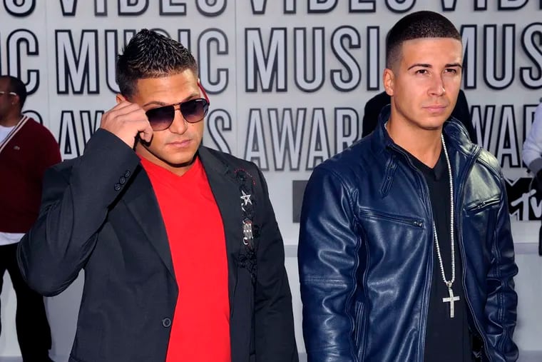 Jersey Shore stars Ronnie Ortiz-Magro, left, and Vinny Guadagnino arrive at the MTV Video Music Awards on Sunday, Sept. 12, 2010 in Los Angeles. (AP Photo/Chris Pizzello)