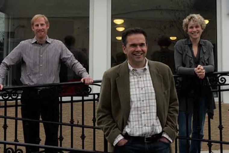 Three partners of BLab. From left to right, Jay Coen Gilbert, Bart Houlhan and Chrissy Houlahan in front of their headquarters in Berwym. ( Bonnnie Weller / Staff Photographer )