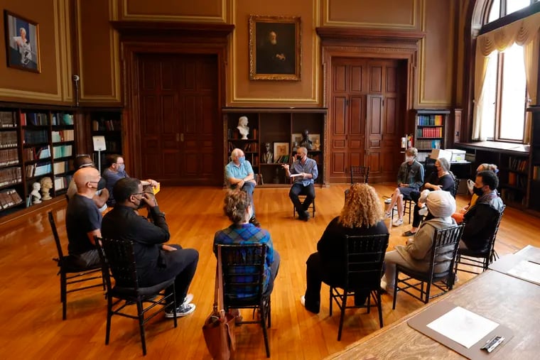 University of the Arts Director of Ph.D. in Creativity Jonathan Fineberg (facing camera on left) and program faculty Zach Savich (facing camera on right) with Ph.D. in Creativity students at the end of a day of study at the Mütter Museum at the College of Physicians in Philadelphia on Wednesday.