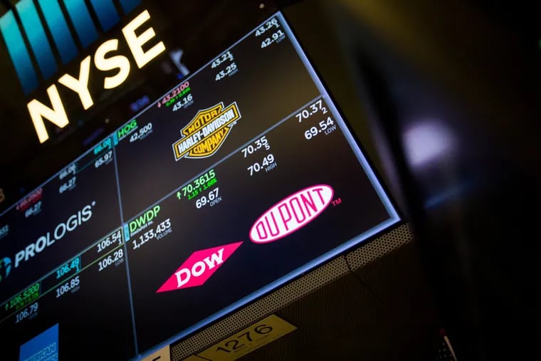 A monitor displays DowDuPont Inc. signage on the floor of the New York Stock Exchange in New York.