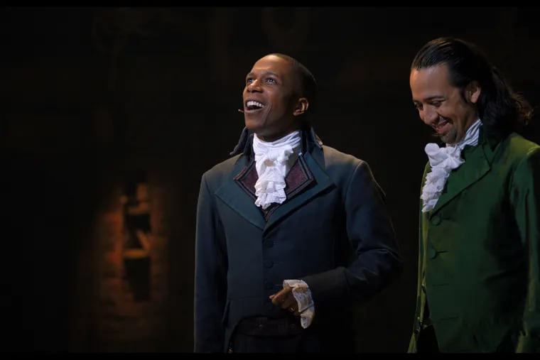 Leslie Odom Jr. (left) as Aaron Burr and Lin-Manuel Miranda as Alexander Hamilton in the filmed version of the original Broadway production of "Hamilton," which premiered on the streaming service Disney+ on July 3.