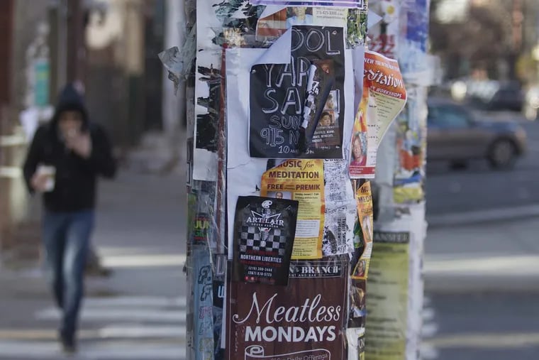 Fliers and posters advertising parties and concerts are shown displayed on a utility pole at 2nd St. in Northern Liberties, Philadelphia. Thursday, January 18, 2018.