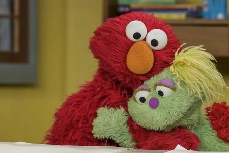 Elmo and Karli on "Sesame Street." In May, the show's creators introduced Karli, a Muppet in foster care, and in October they revealed the reason for her situation: Her mom struggles with substance abuse.