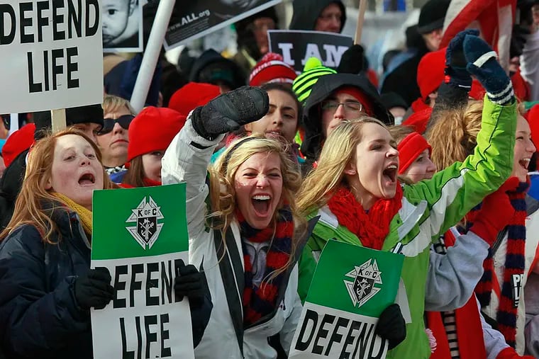 Supporters cheer during an anti-abortion march from the National Mall to the Supreme Court in Washington, Monday, Jan. 24, 2011. The anniversary of the Supreme Court decision Roe v. Wade was January 22nd.