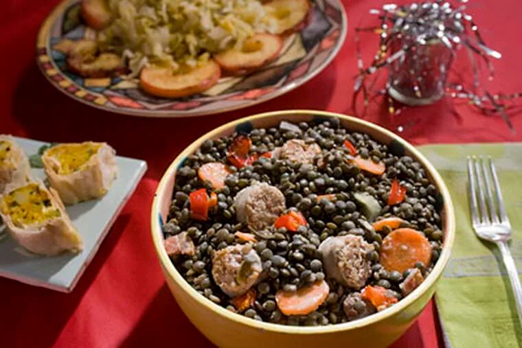 Lentils With Sausage is part of an Italian meal that includes golden potatoes in filo and Sauerkraut With Apple Rings. (CLEM MURRAY / Staff Photographer)