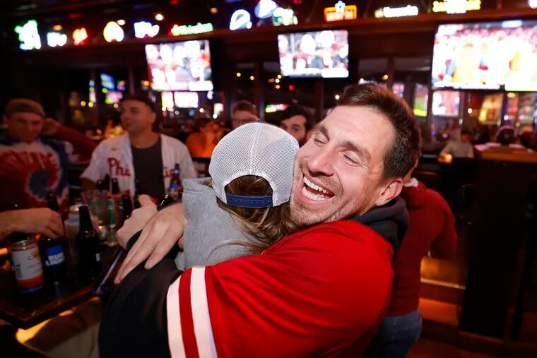 Just before midnight, at Chickie’s & Pete’s in South Phila., Justin Wilfon of Haddonfield celebrates after the Phillies won the best of three series against the St. Louis Cardinals on October 8, 2022.