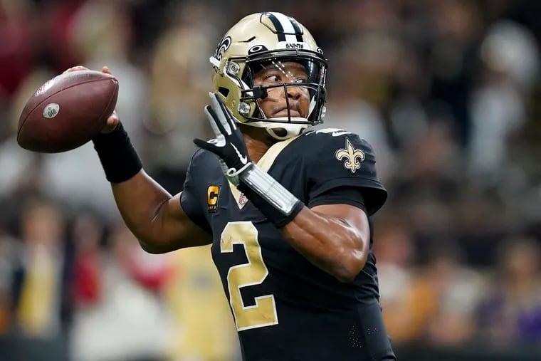 New Orleans Saints quarterback Jameis Winston passes against the Tampa Bay Buccaneers during a 2022 game.
