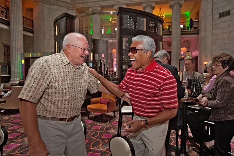 Dick Lucas (left) and former teammate Timmy Brown share a laugh at a 50-year anniversary celebration of the 1960 Eagles NFL championship team on Sept. 10, 2010.