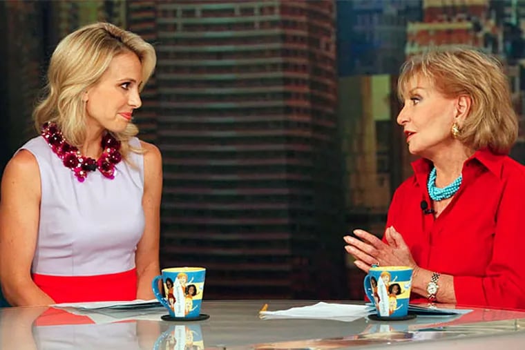 Elisabeth Hasselbeck (left) on her last day on "The View" with Barbara Walters. Hasselbeck will join Fox News Channel in September.