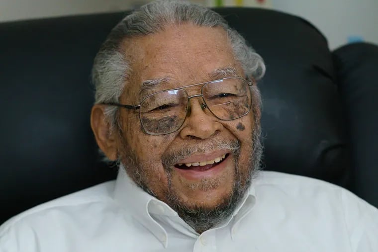 Nelson Henry, Jr., 95, shown here in his home in Philadelphia, talks about his eviction from the U.S. Army in 1945 with a "blue discharge." Nearly 75 years later, the Army upgraded his discharge to honorable.