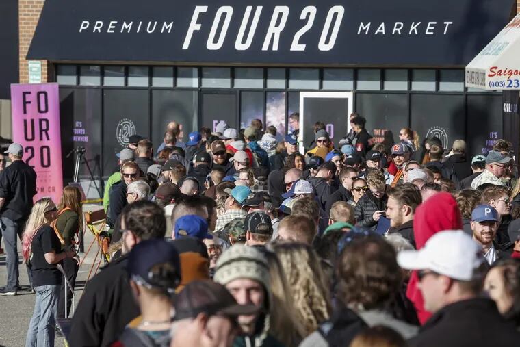 People line-up to purchase legal cannabis in Calgary, Alberta, Wednesday, Oct. 17.