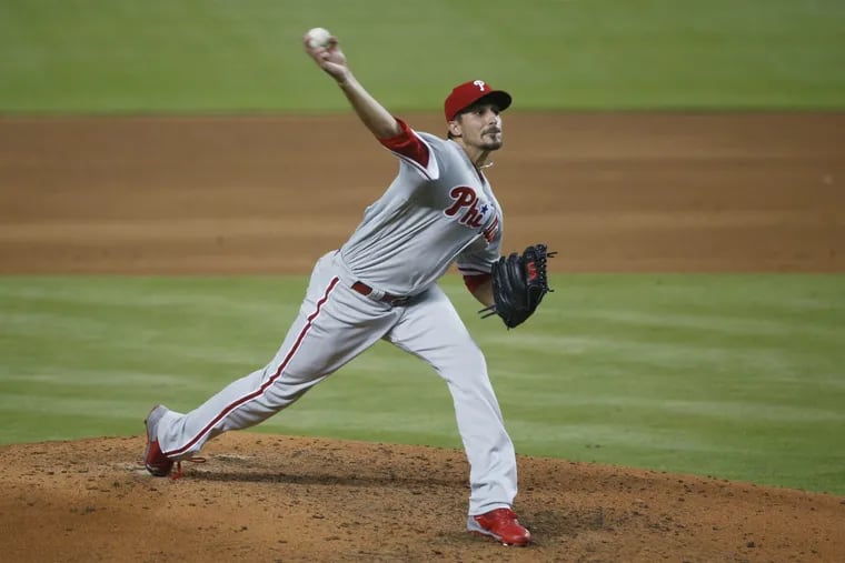 Philadelphia Phillies' Zach Eflin delivers a pitch during the sixth inning of the team's baseball game against the Miami Marlins, Tuesday, May 1, 2018, in Miami. Making his season debut, Eflin retired the first 15 batters but gave up a pinch-hit home run to Justin Bour in the sixth. The Marlins defeated the Phillies 2-1 in 10 innings. (AP Photo/Wilfredo Lee)