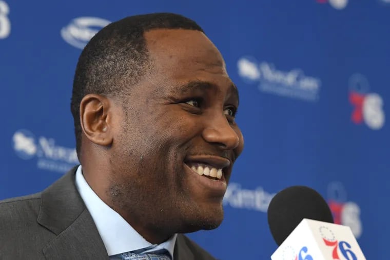 Elton Brand smiles after getting introduced by Managing Owner, Joshua Harris as the new Sixers General Manager during a press conference at the 76ers training facility in Camden, New Jersey. Thursday, September 20, 2018.