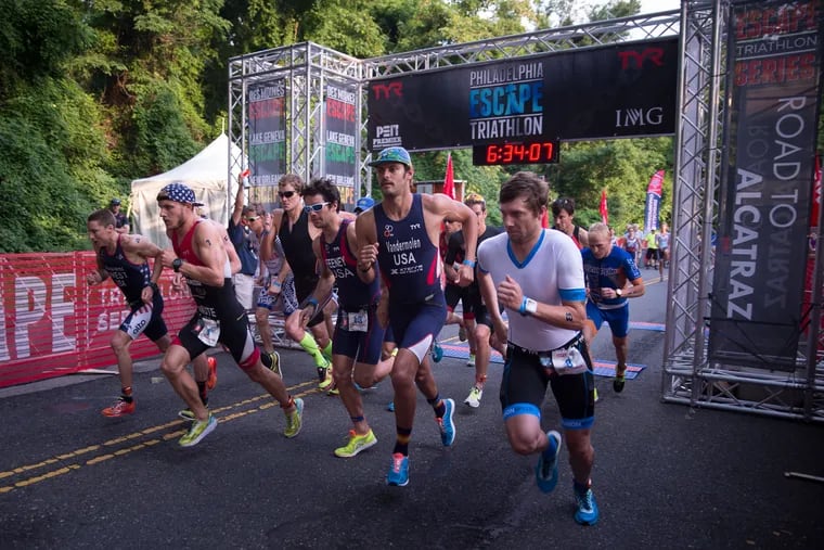 The professional men start their race at the Philadelphia Escape Triathlon in Fairmount Park, June 25th, 2017. Jason West, the eventual winner, is the furthest to the left.