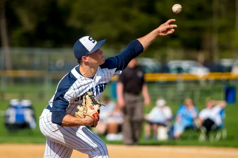 Shawnee pitcher Jackson Balzan delivers during the  3-2 win over Highland.