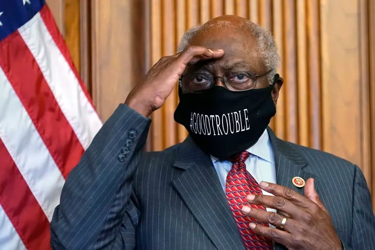 House Majority Whip James Clyburn, of S.C., shields his eyes from a television light during a news conference about COVID-19, on Capitol Hill in Washington. Clyburn, a member of the Selma Bridge Crossing Jubilee's honorary committee, believes one way to honor the memory of Lewis and others is to enact the John Lewis Voting Rights Act, to strengthen protections granted under the Voting Rights Act of 1965 and protect against racial discrimination and vote suppression.