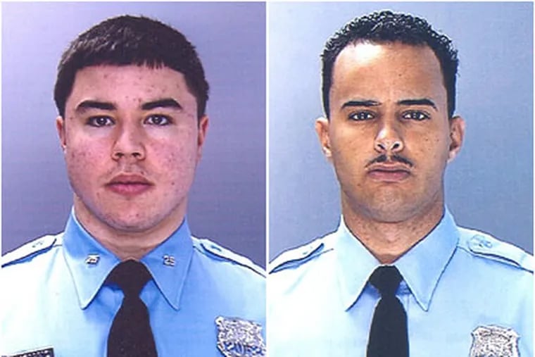 Philadelphia police officers Christopher Luciano, left, and Sean Alivera, right, have been charged with robbing an undercover investigator posing as a drug dealer.