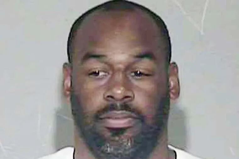 In a photo provided by the Maricopa County Sheriff's Office, former NFL quarterback Donovan McNabb appears in a photo at jail. McNabb has been released from an Arizona jail after serving a one-day sentence for a DUI arrest late last year. Records released by West Mesa Justice Court show the 37-year-old McNabb served his time Wednesday and was released Thursday morning. McNabb was arrested Dec. 15 on the Salt River Pima-Maricopa Indian Community. He pleaded guilty on March 27 and nine days of his sentence was suspended. (AP Photo/Maricopa County Sheriff's Office)