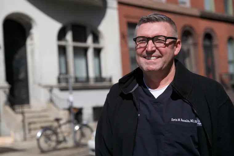 Kevin Baumlin, head of ER at Pennsylvania Hospital and Democratic candidate for U.S. Senate, poses for a portrait outside of his home in Philadelphia on Wednesday, April 07, 2021.