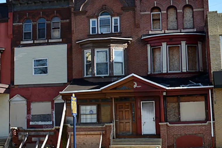 John Coltrane's house (center) in Strawberry Mansion has been put on the Preservation Alliance's Endangered Properties List. It's a National Historic Landmark in need of repairs.
