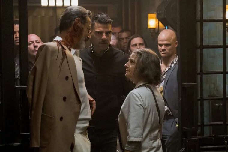 This image released by Global Road Entertainment shows, from left, Jeff Goldblum, Zachary Quinto and Jodie Foster in a scene from "Hotel Artemis." 
