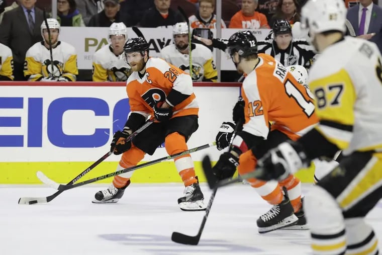 Flyers center Claude Giroux said the team needs to put its Game 3 5-1 blowout loss to the Penguins at home on Sunday behind them. YONG KIM / Staff Photographer