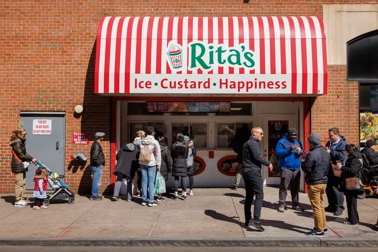 Free water ice at Rita’s on 200 block of South Street on first day of spring, Monday, March 20, 2023.